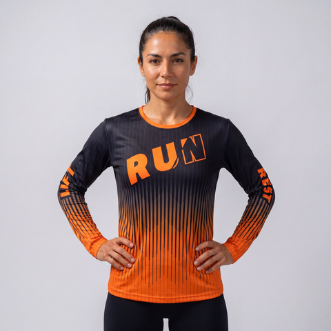 Female athlete wearing a black and orange RUN REST LIFT REPEAT long sleeve performance shirt, front view