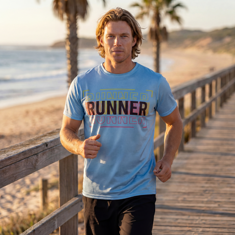 Male runner jogging in aqua blue RUNNER performance shirt