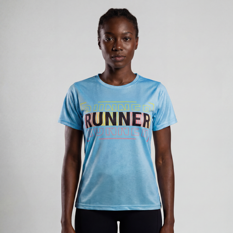 Woman wearing aqua blue RUNNER graphic performance t-shirt outdoors with the design clearly visible on the front.