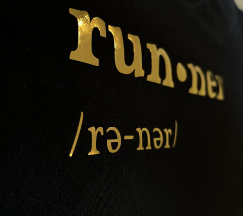 Running T-Shirt - Dictionary Entry black and gold close up